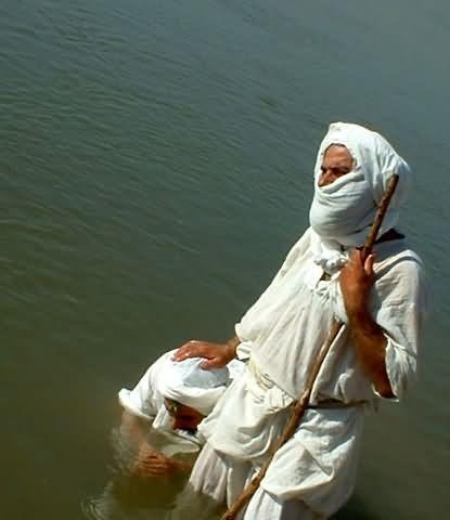 First-priest-baptizing-his-apprentice.jpg